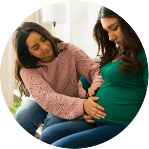Doula assisting pregnant woman